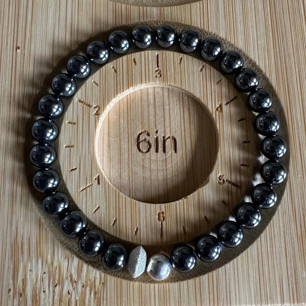 Polished 6mm Polished Jet Hematite Stretch Bracelet w/ Sterling Silver Spacers